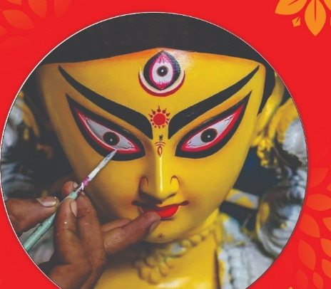 Chokkhu daan — painting the eyes of the Durga idol